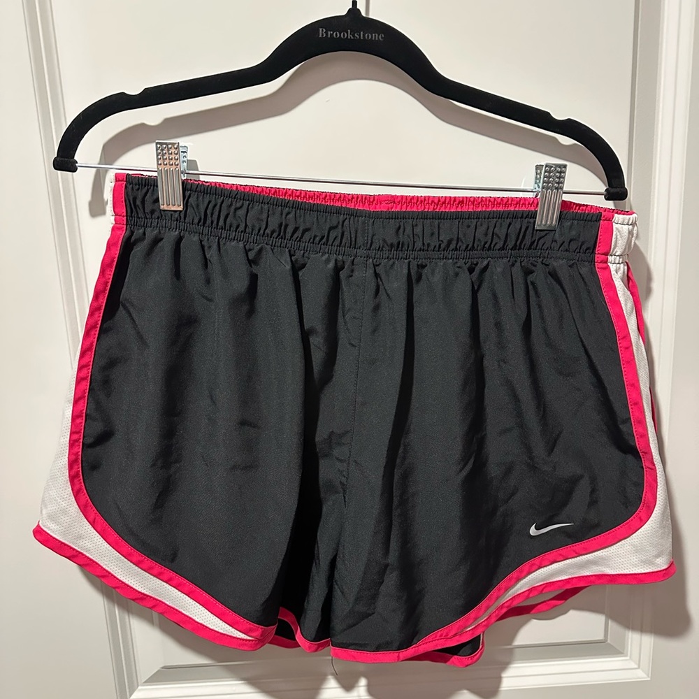 Nike Black and Pink Athletic Shorts with Curved Hem